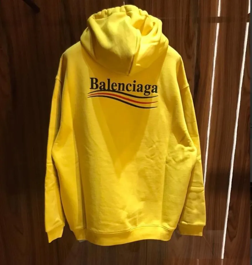 BALENCIAGA  |Men's political campaign medium fit hoodie in grey