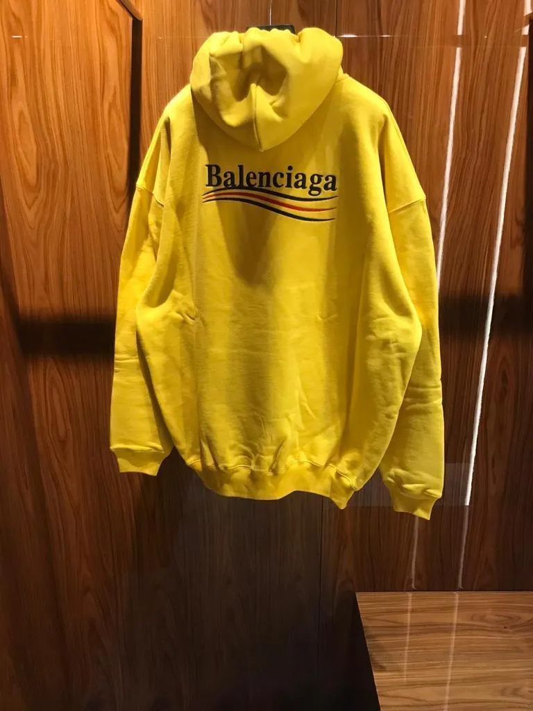 BALENCIAGA  |Men's political campaign medium fit hoodie in grey