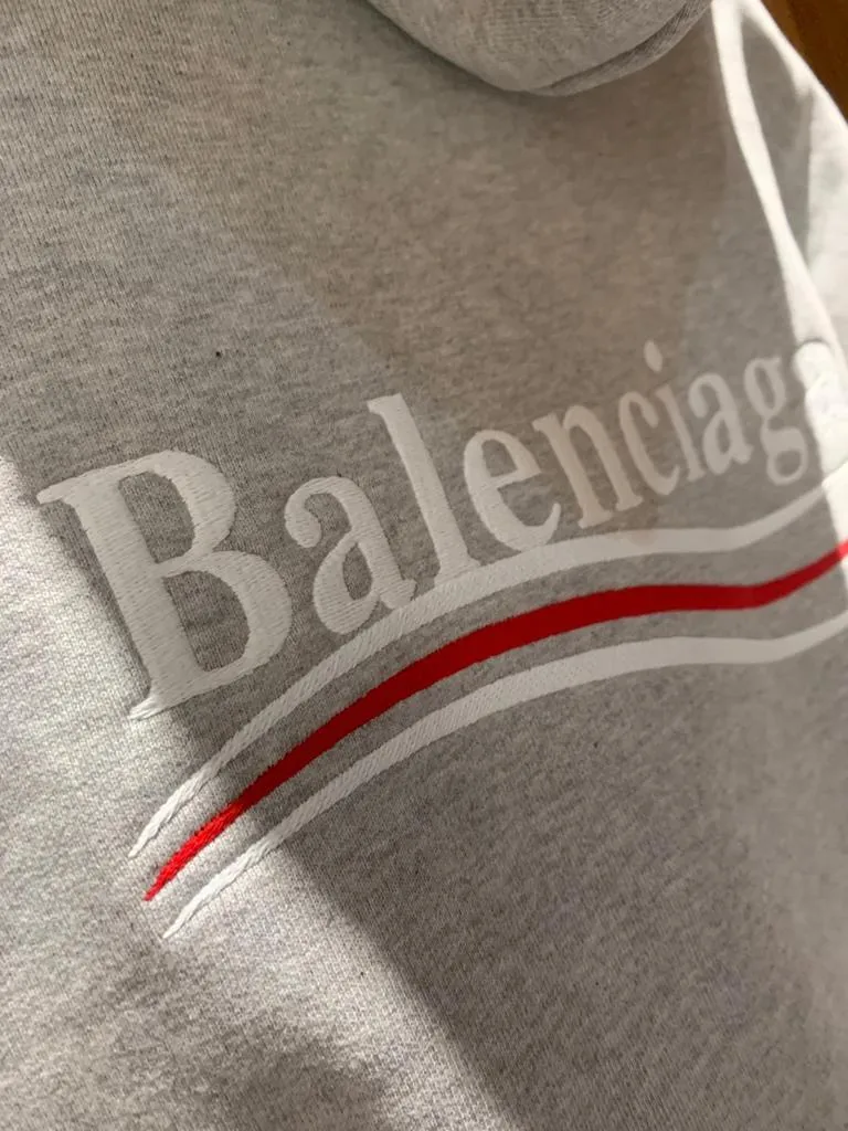 BALENCIAGA  |Men's political campaign medium fit hoodie in grey